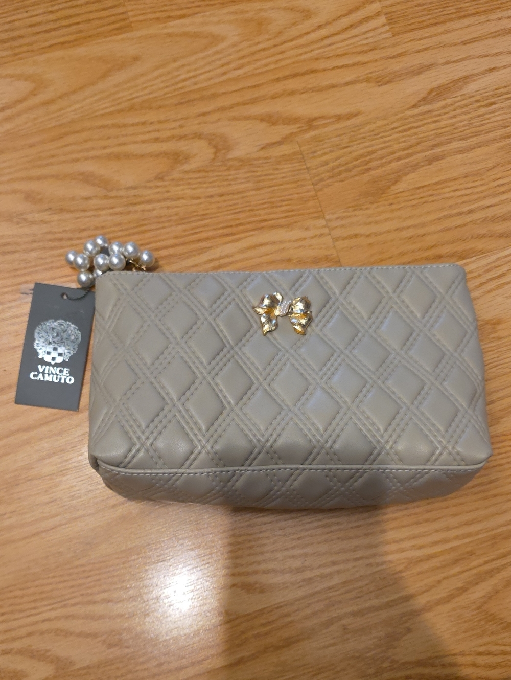 Vince Camuto Quilted Taupe Cosmetic Pouch with Gold Bow Accent